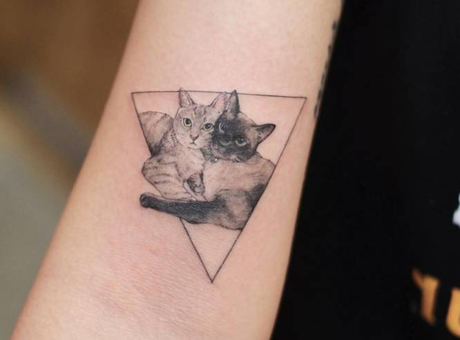 tatuaje pequeño gato