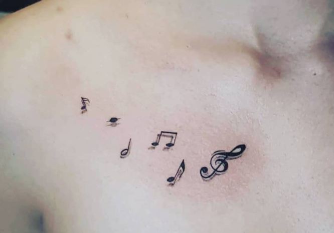 tatuaje clave sol notas musicales