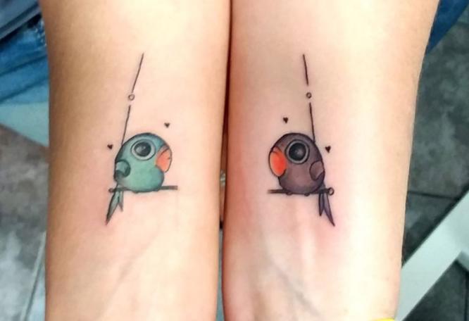 tatuajes pareja loros