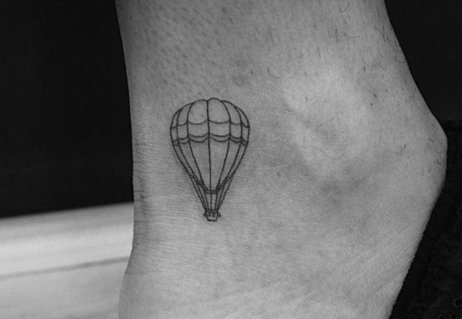 tatuajes viajes globo